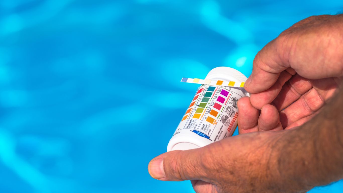 Image of a pool water testing kit with the pH levels displayed on the chart